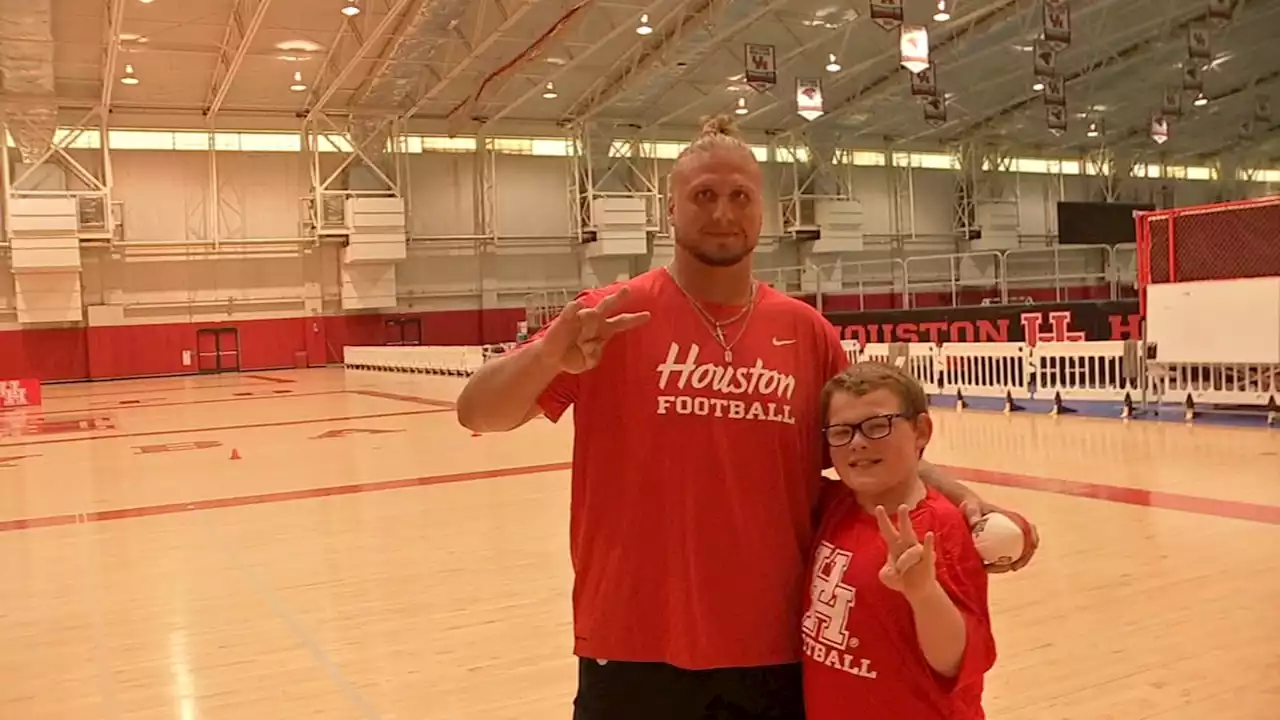 UH football player uses personal experience to help youngster who was bullied