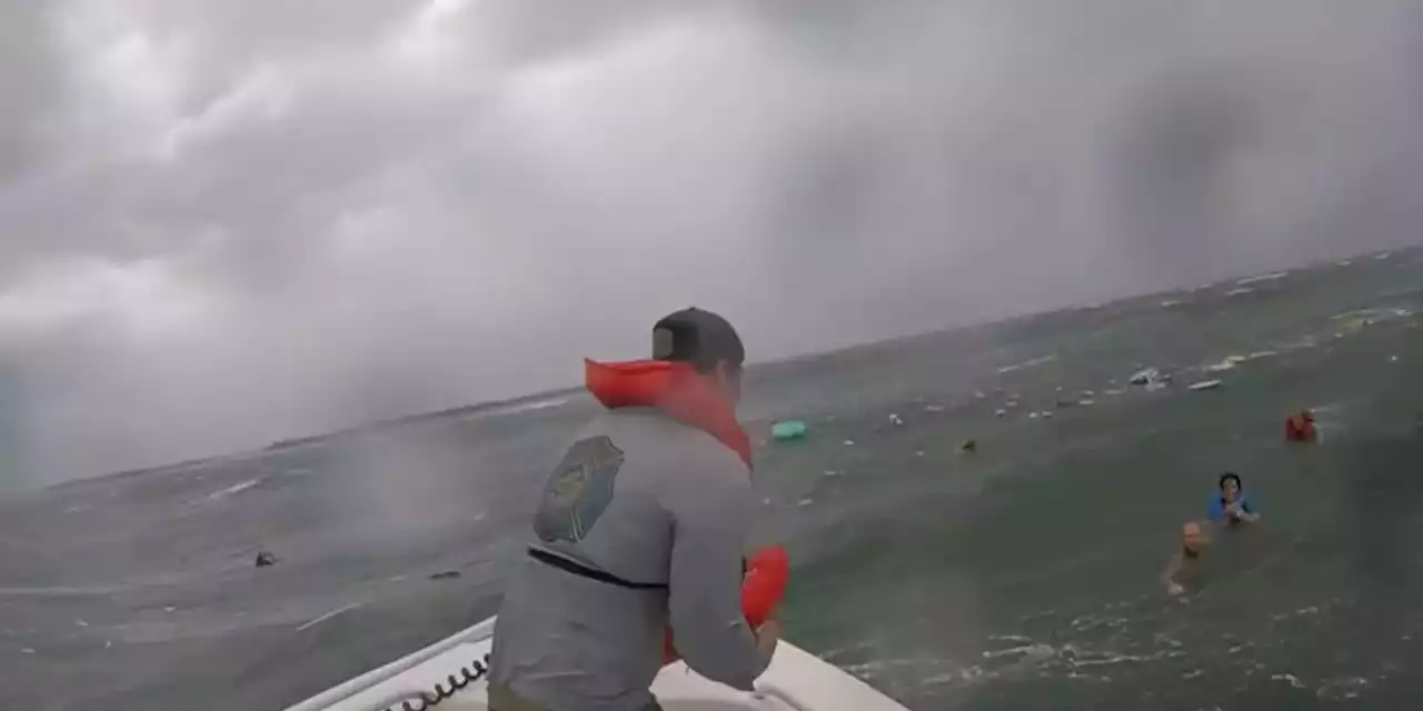 CAUGHT ON CAMERA: Good Samaritans help rescue four people after boat capsizes