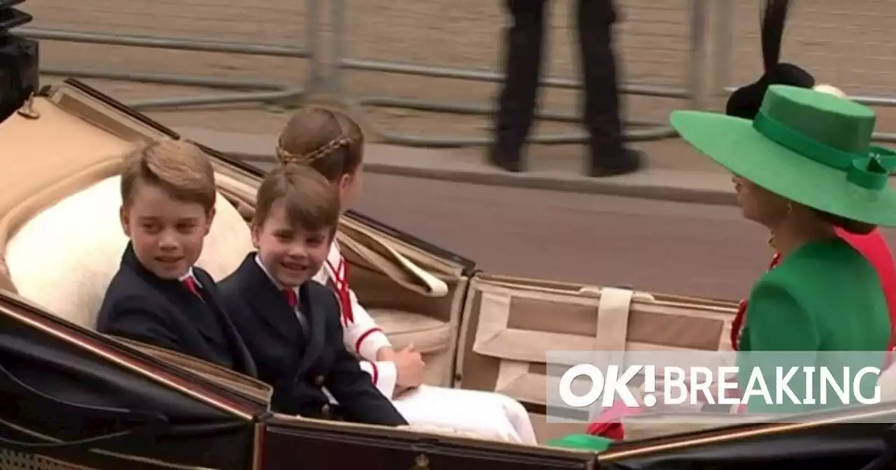 George and Charlotte wave to royal crowds as they keep an eye on brother Louis