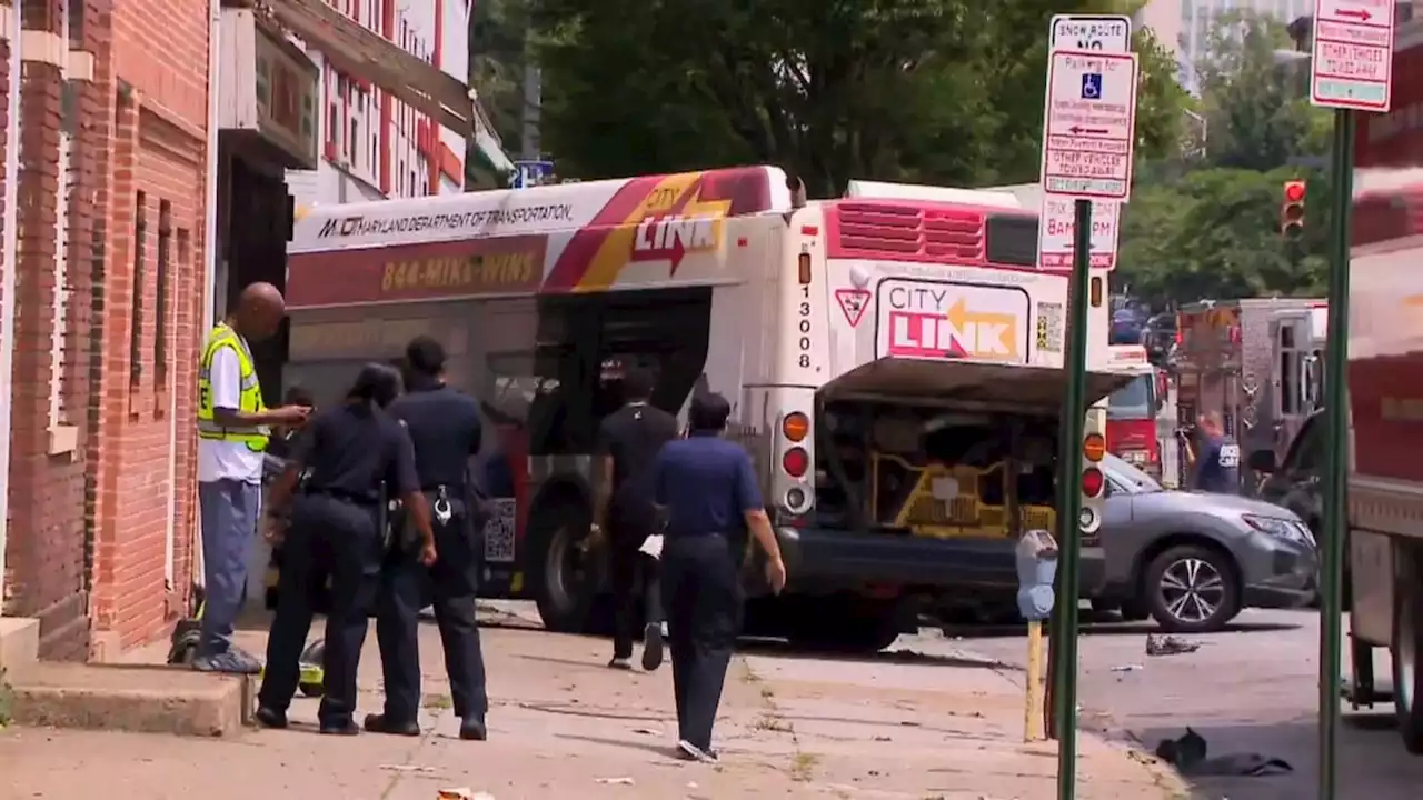 At least 17 injured after bus crashes into car, building in Baltimore: officials