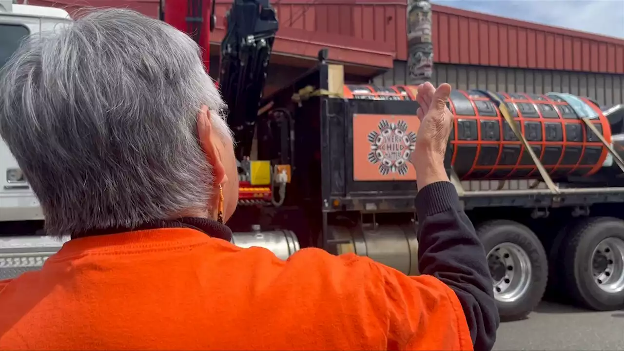 Memorial pole honouring residential school victims tours Vancouver Island