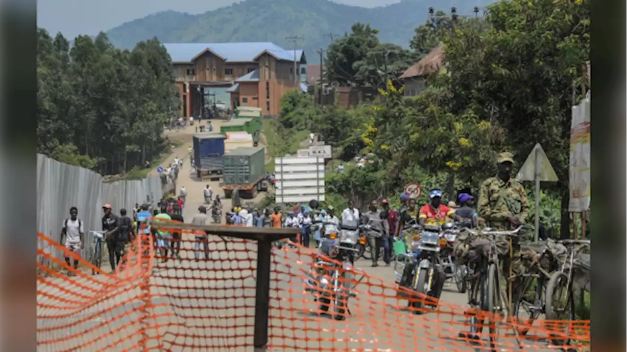 Ugandan border town prepares to bury victims of rebel massacre that left 42 dead, mostly students