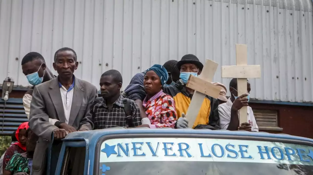 Ugandan border town prepares to bury victims of rebel massacre that left 42 dead, mostly students