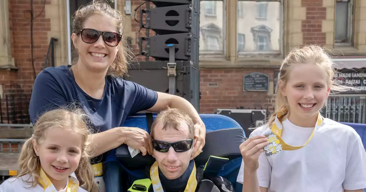 Wonderful photos of Rob Burrow's lap of honour with his family in Leeds