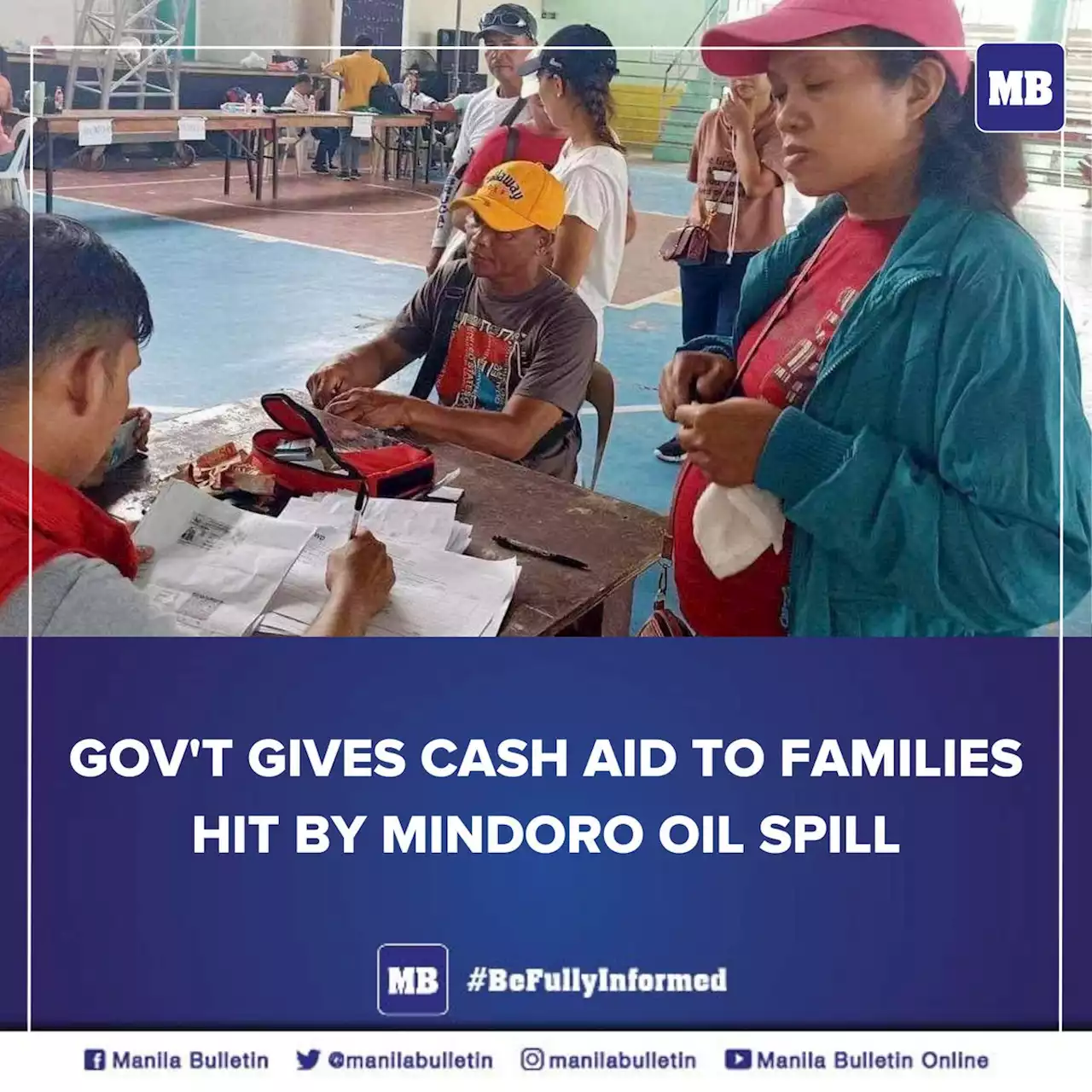 Gov't gives cash aid to families hit by Mindoro oil spill