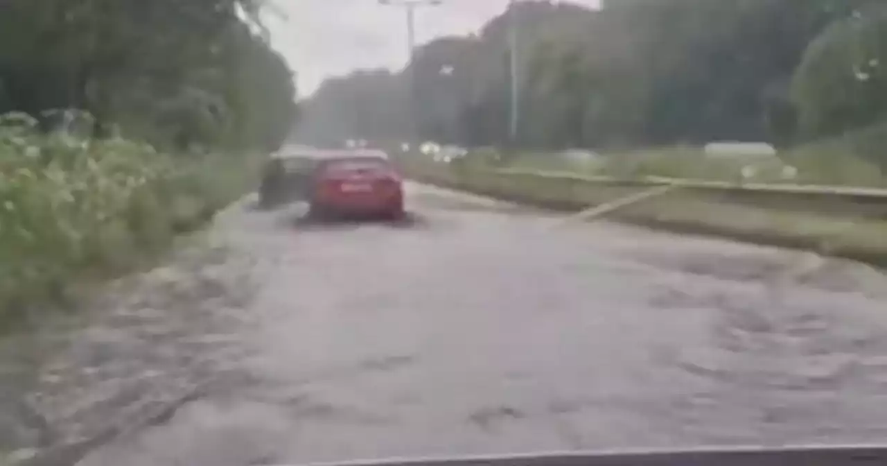 Video shows A52 swamped as flash flooding hits busy road