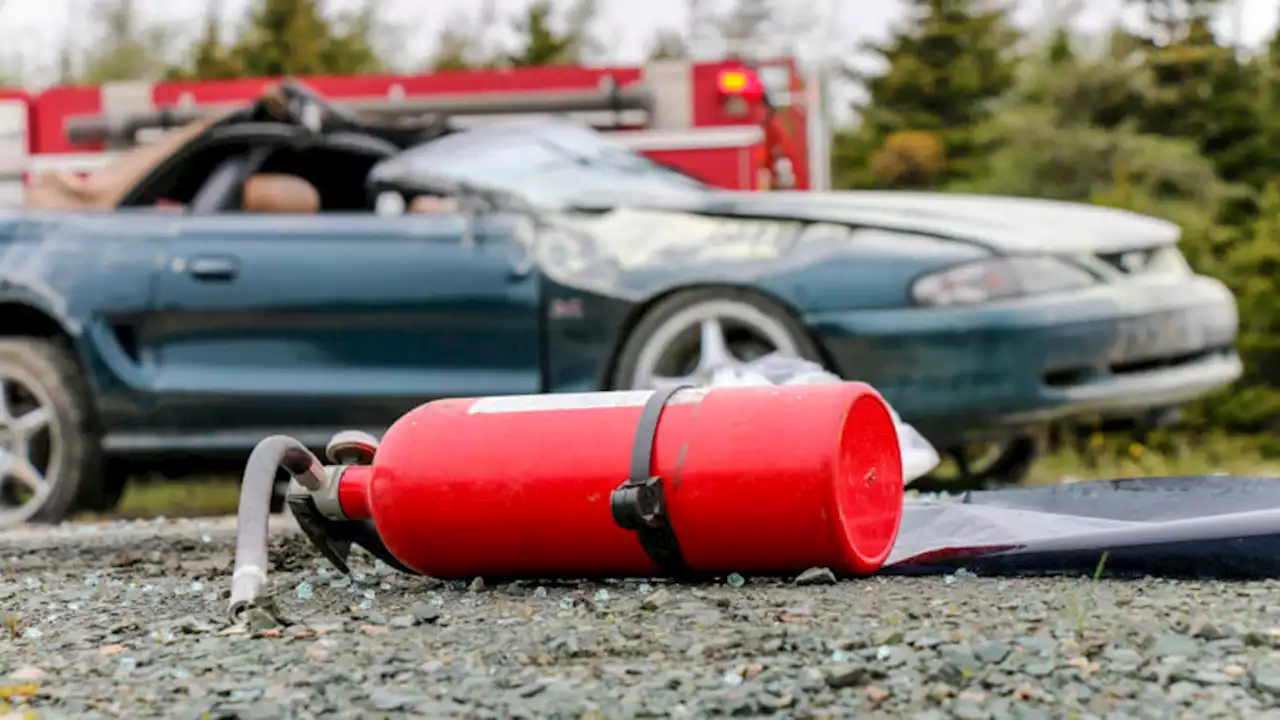 Updated: Morning rollover closes road, sends two to hospital