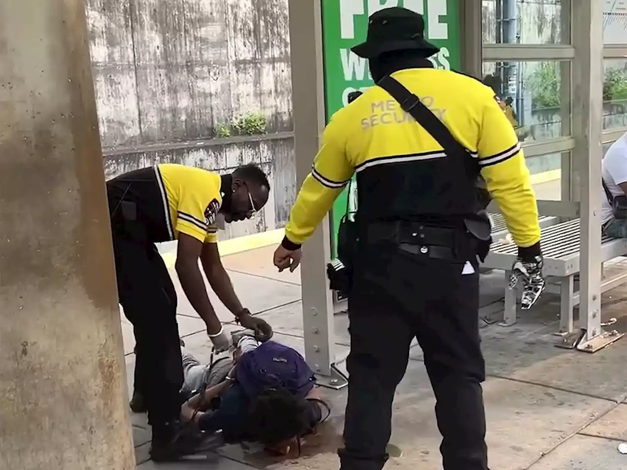 St. Louis security guard punches man lying on light rail platform, video shows