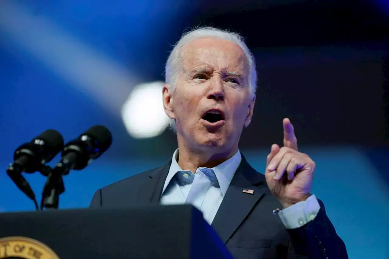 President Biden strikes economic populist tone during rally before exuberant union members