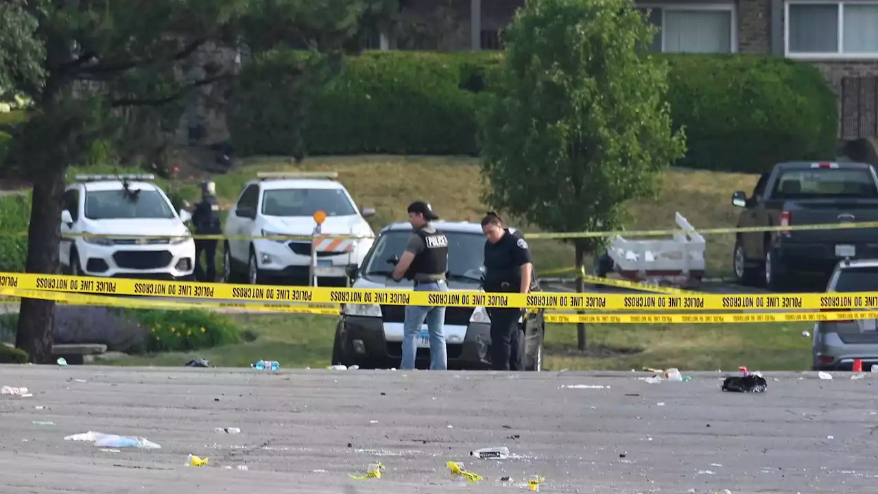 Parking lot party shooting leaves 1 dead and 22 people hurt in suburban Chicago