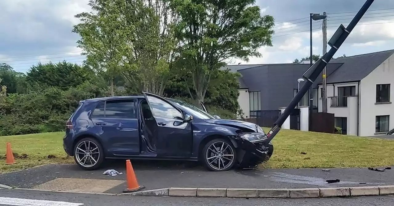 Three arrested after car crashes into school grounds