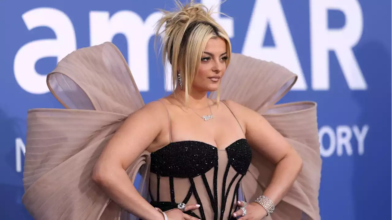 Bebe Rexha rushed off stage after she was hit in the head by a phone