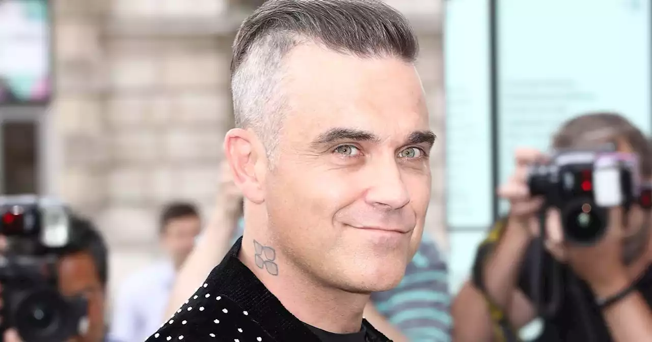 Robbie Williams forced to stop mid way through performance due to long Covid