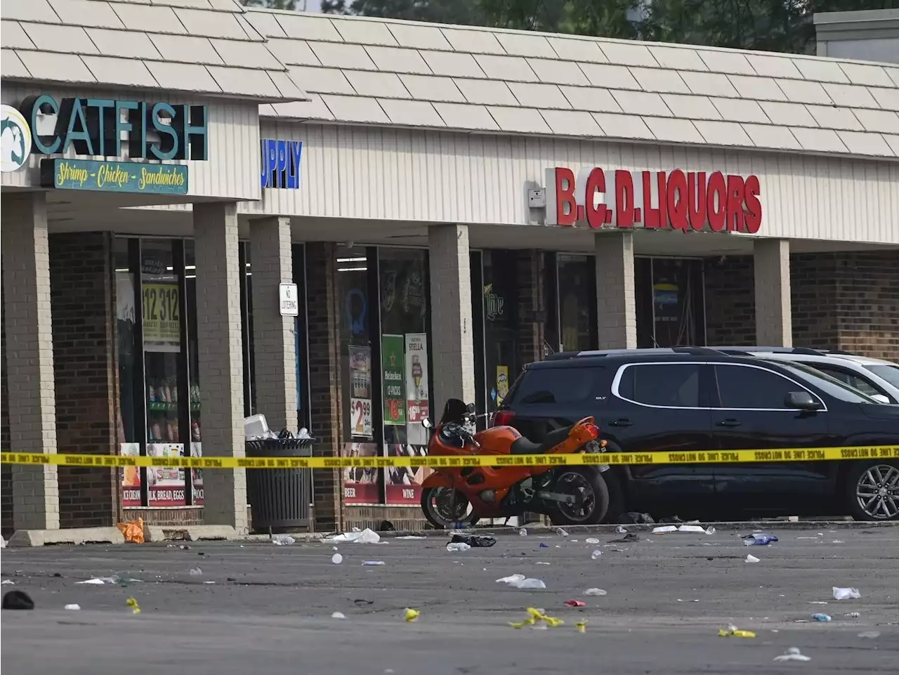 Parking lot party shooting leaves one dead and at least 22 hurt in suburban Chicago