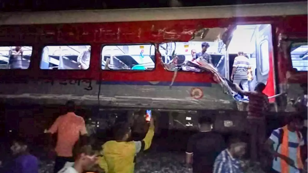 Passenger trains derail in India, killing at least 50, trapping many others