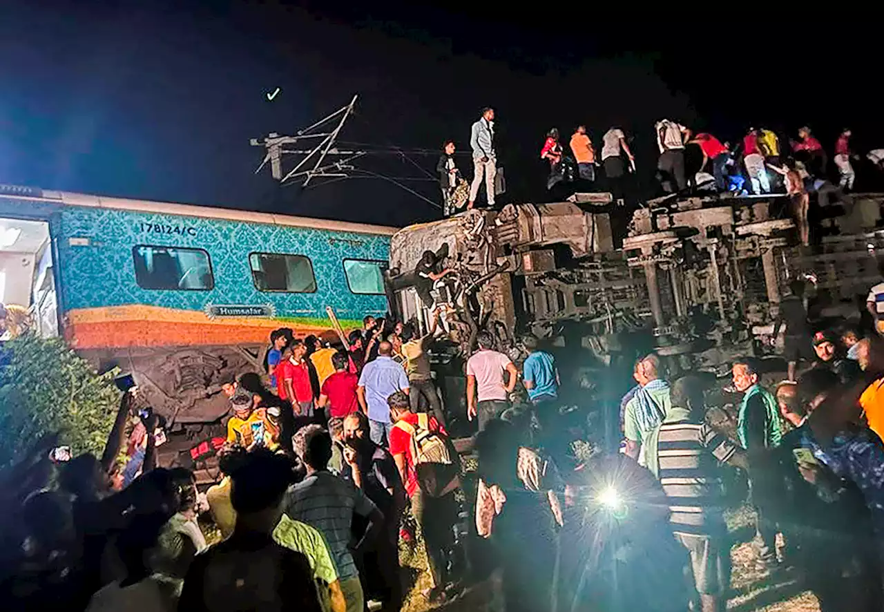 At least 50 dead as two trains derail in eastern India