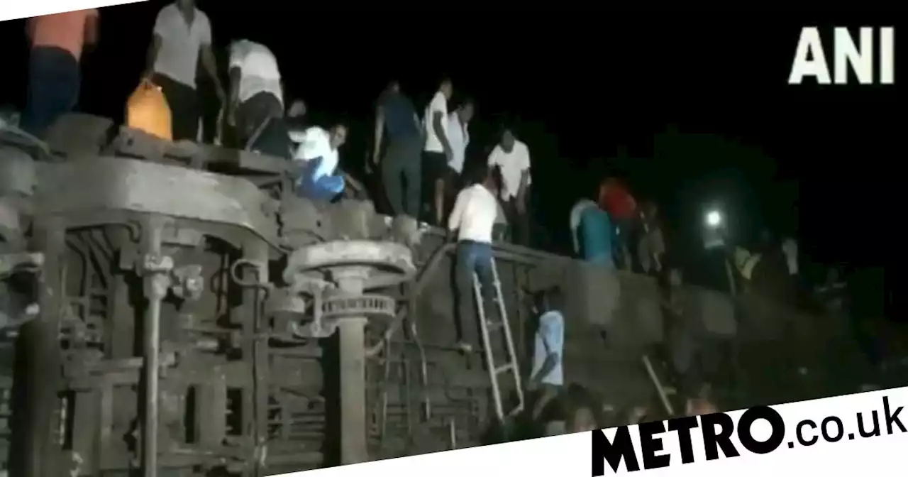 Dozens feared dead after passenger train derails in India