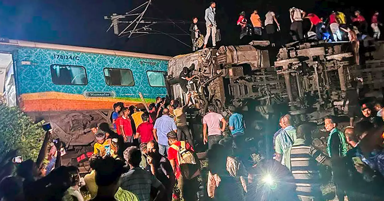 Dozens dead, over 350 injured after trains derail in India, officials say