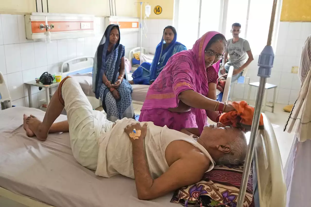 Days of sweltering heat, power cuts in northern India overwhelm hospitals as death toll climbs