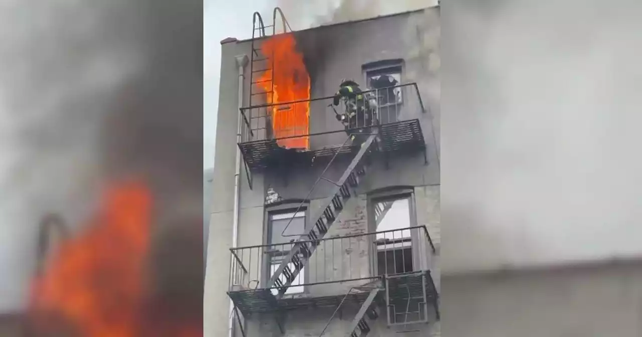 See It: Firefighters save man from 4th floor window of burning apartment in Brooklyn