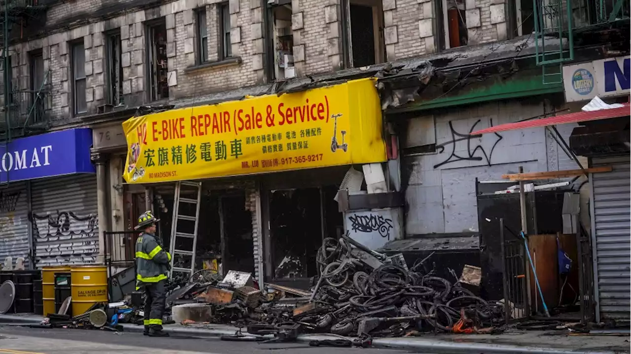 4 dead after fire in e-bike shop spreads to apartments in New York City