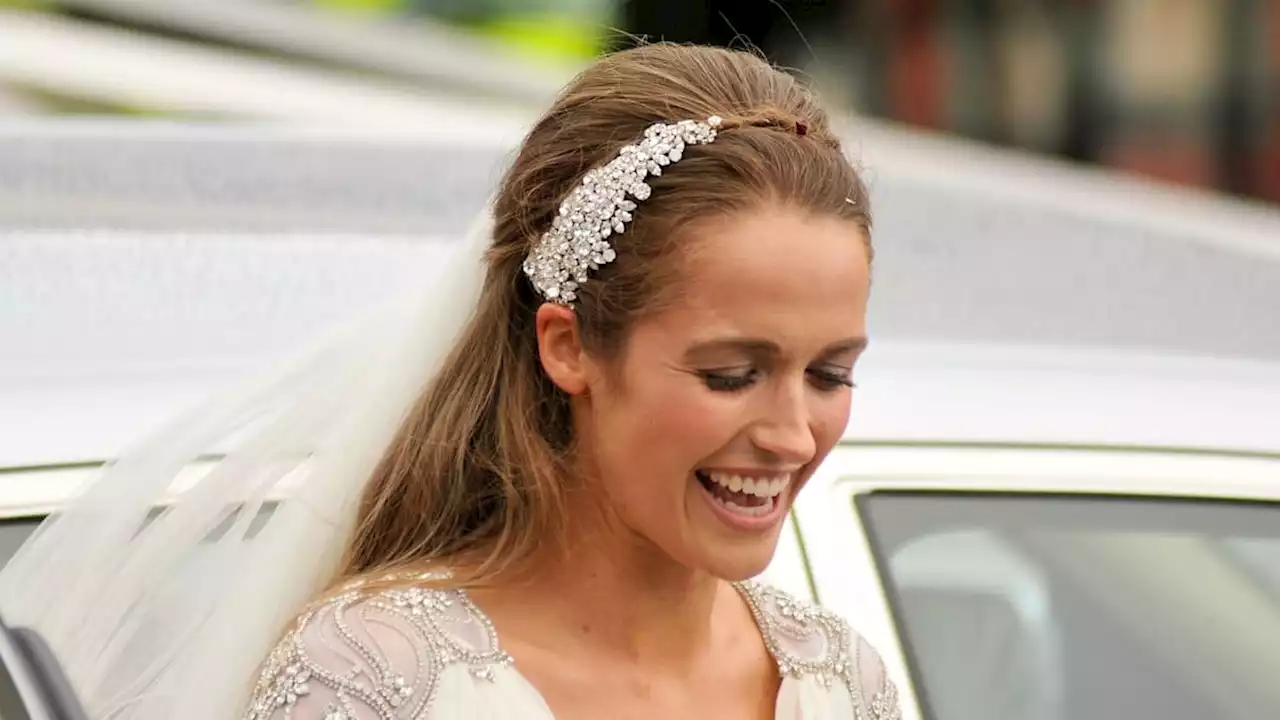 Andy Murray's wife Kim is a boho beauty in low-back bridal gown in unseen wedding photo