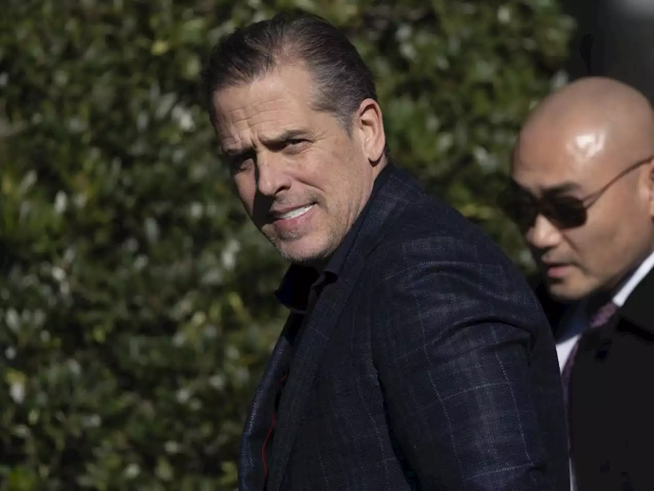 Hunter Biden charged with failing to pay federal income tax and illegally having a weapon