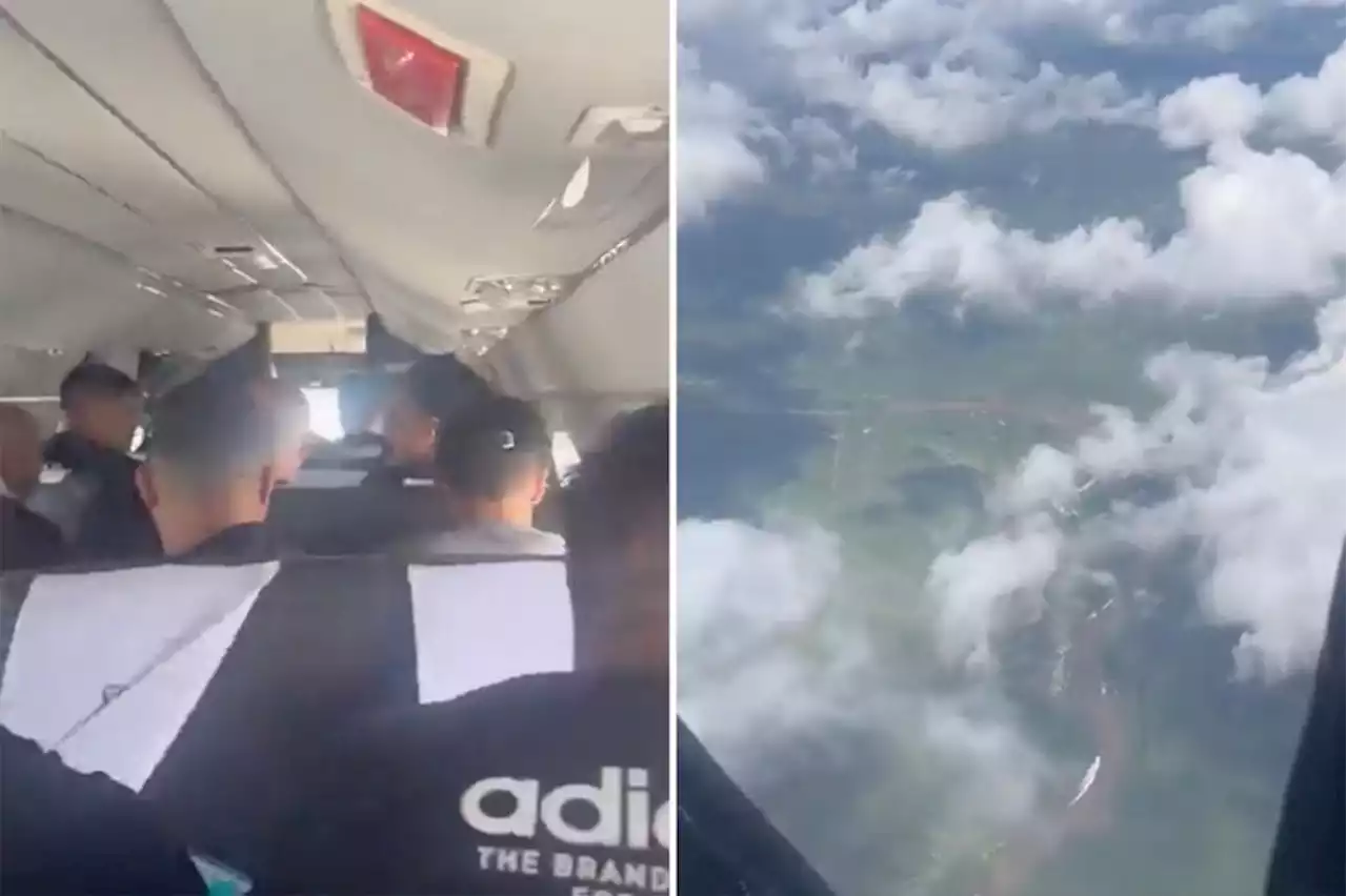 Plane door busts open in midair as passengers sit stunned, jaw-dropping video shows