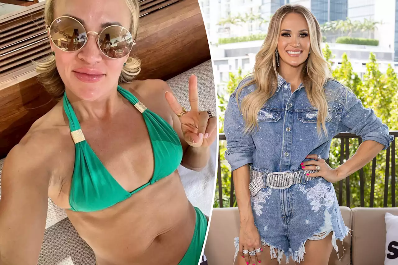 Carrie Underwood shows off incredible abs in green bikini