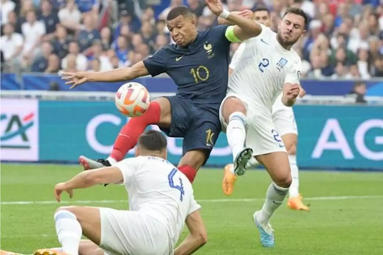 Record Mbappe leads France to another Euro qualifier win against 10-man Greece