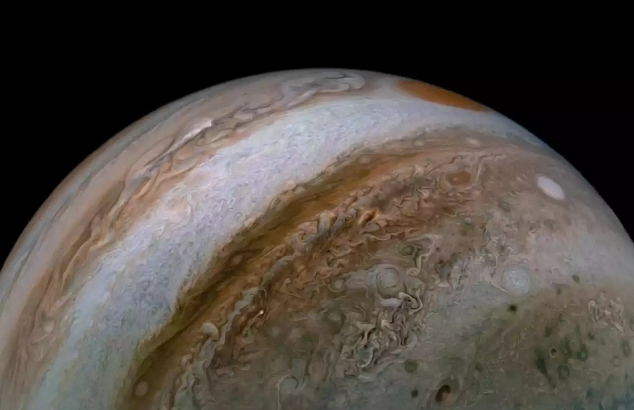 NASA’s Juno mission snaps photo of a strange green orb on Jupiter