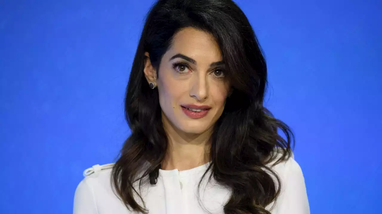 Amal Clooney’s Holiday Hair Is All About Bombshell Curls