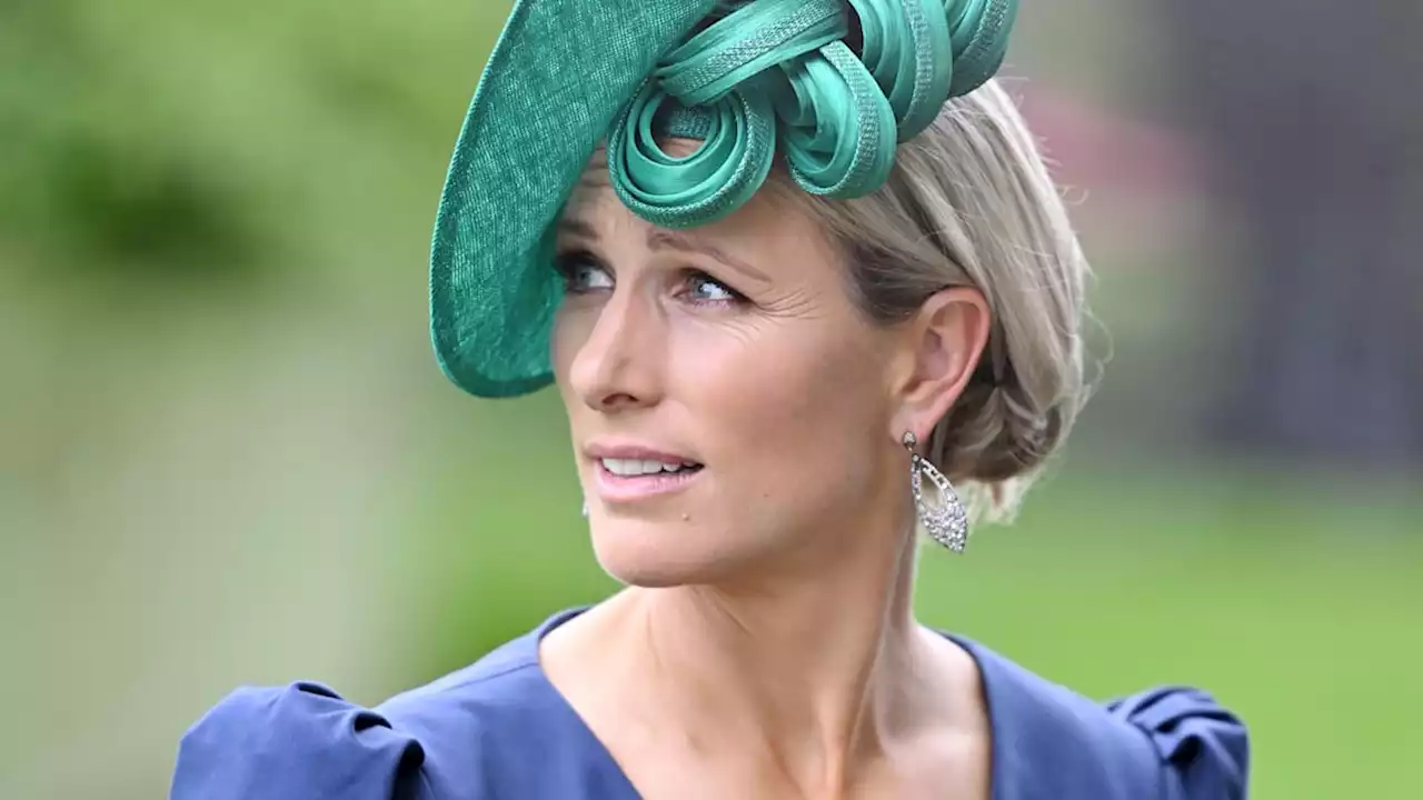 Zara Tindall surprises in plunging satin gown and daring emerald hat