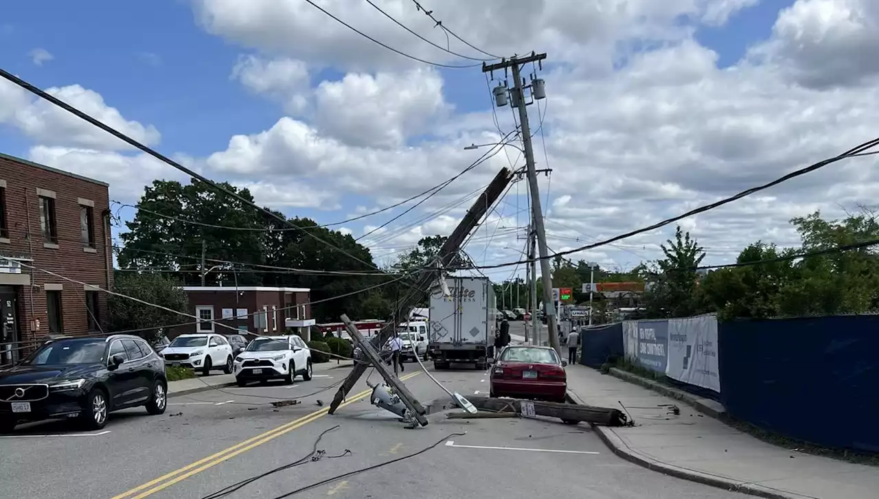 Road closed for several hours after crash brings down light pole in Norwood