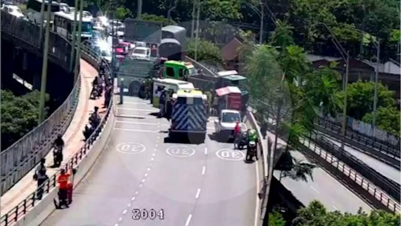 Accidente en reconocido puente de Medellín dejó dos personas heridas; camión arrolló moto - Pulzo