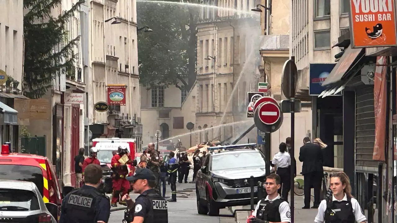 Two people missing and seven 'critical' after explosion in Paris sparks fire and reduces buildings to rubble