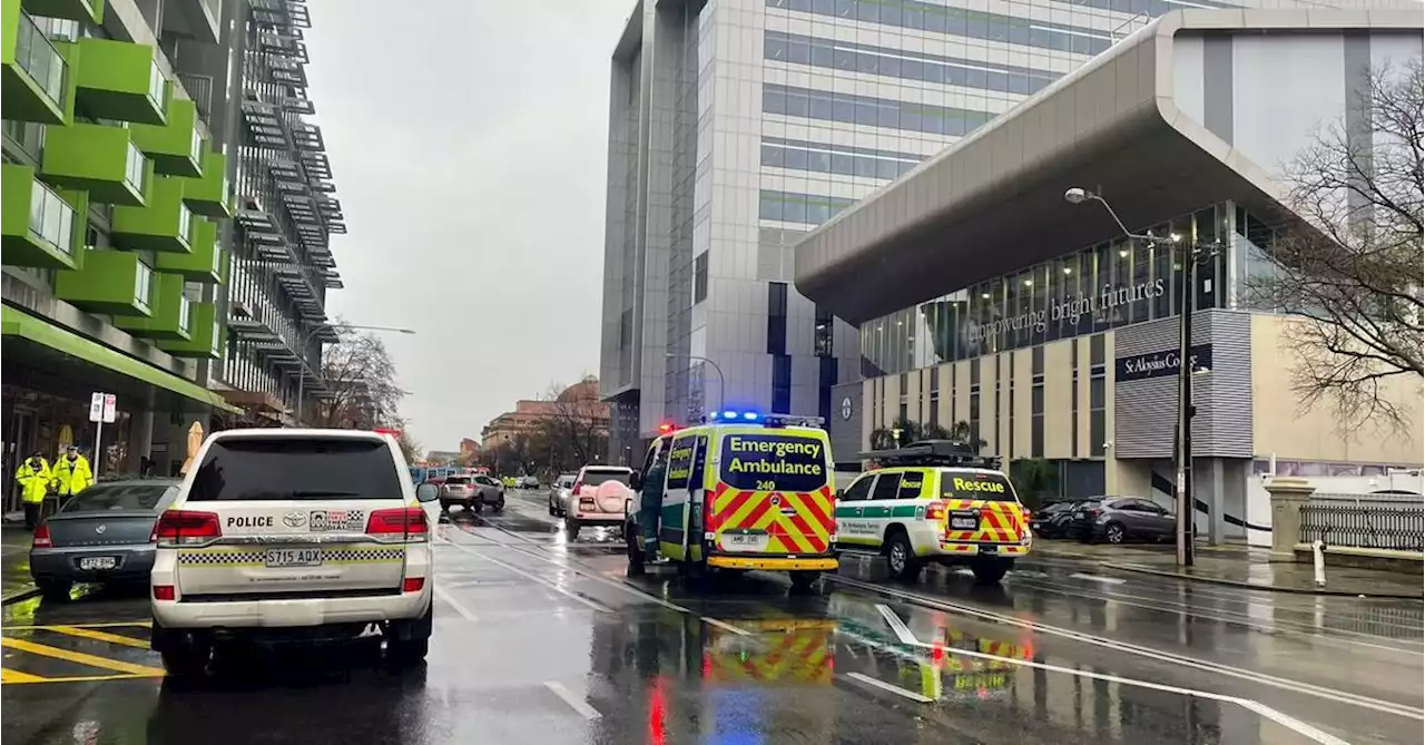 Woman and child hit by car outside Adelaide school during ﻿drop-off