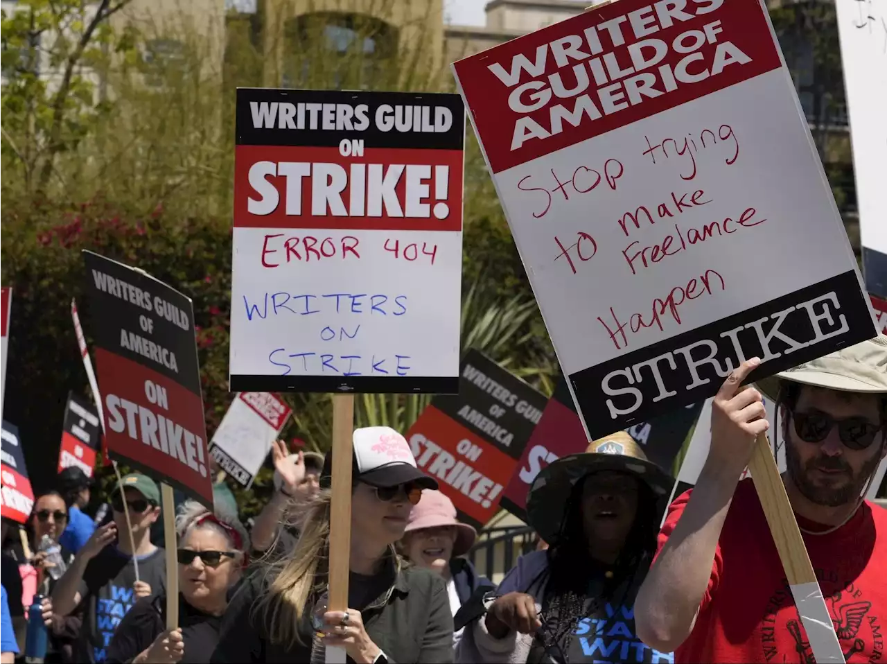 Hollywood writers at rally say they'll win as strike reaches 50 days