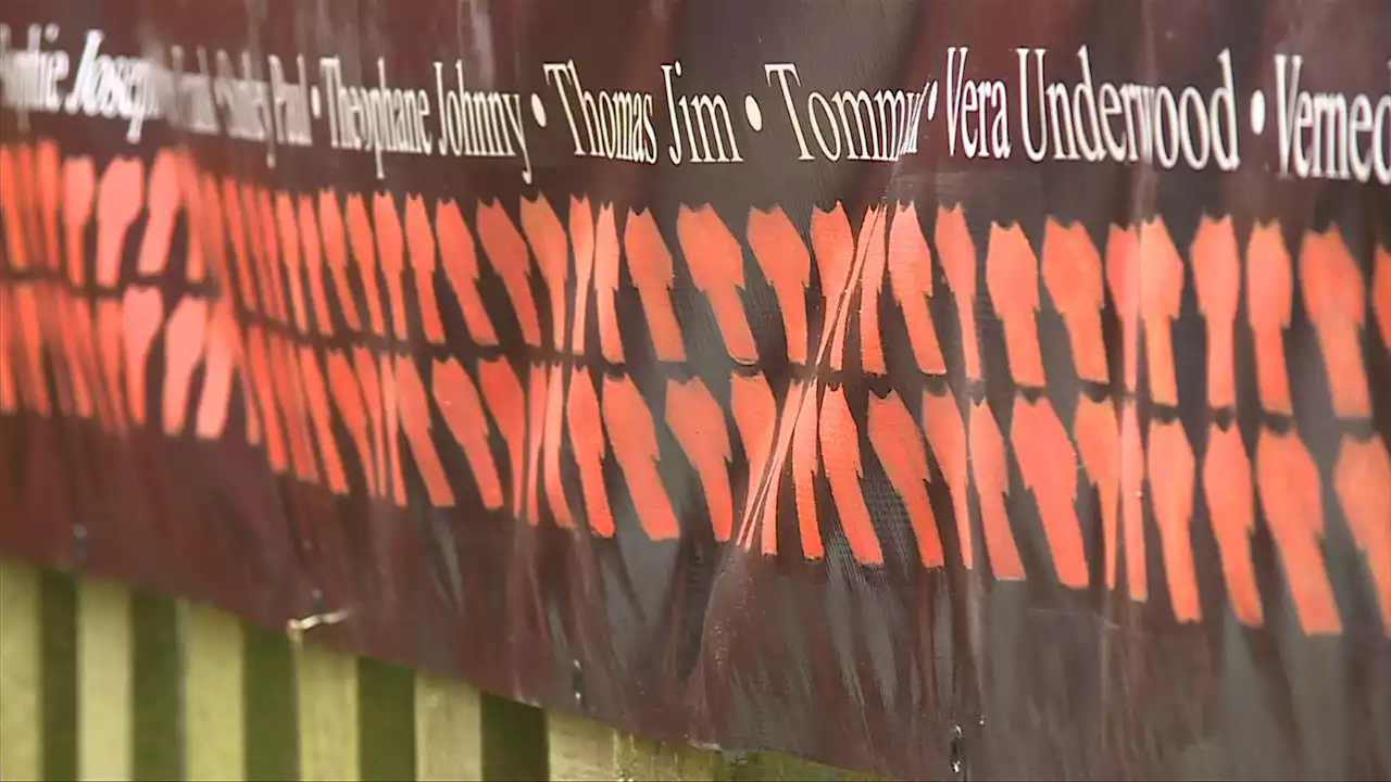 New banner names those known to have died at the Kuper Island Residential School