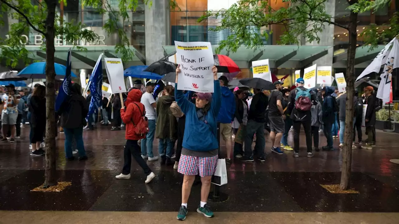 Hollywood writers at rally say they'll win as strike reaches 50 days