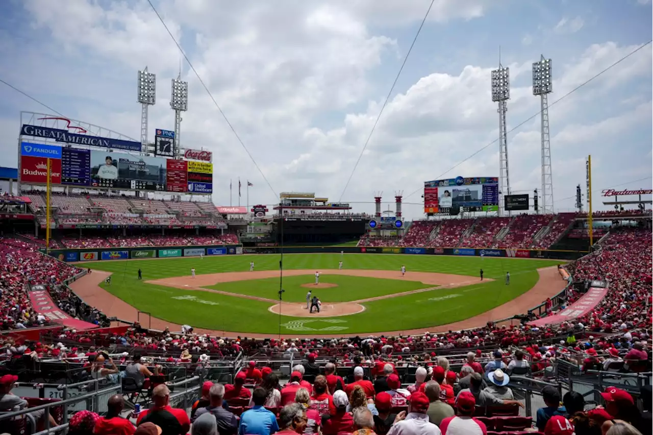 Rockies lose eighth straight to sizzling Reds, who win 11th game in a row