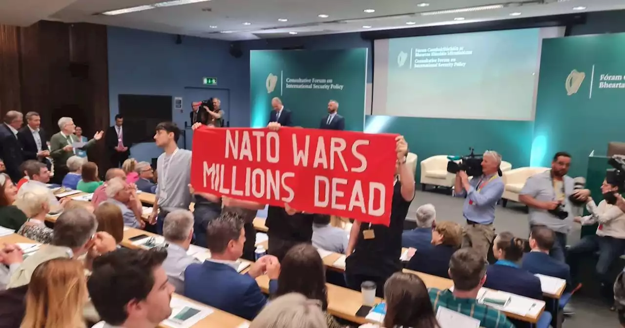 Protesters interrupt Micheál Martin’s opening address at security forum
