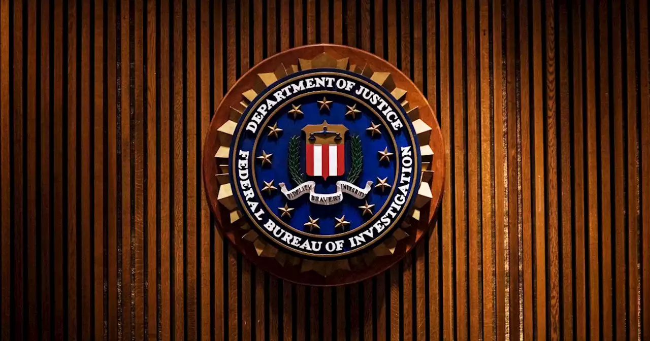 Former FBI analyst sentenced to nearly 4 years over classified docs