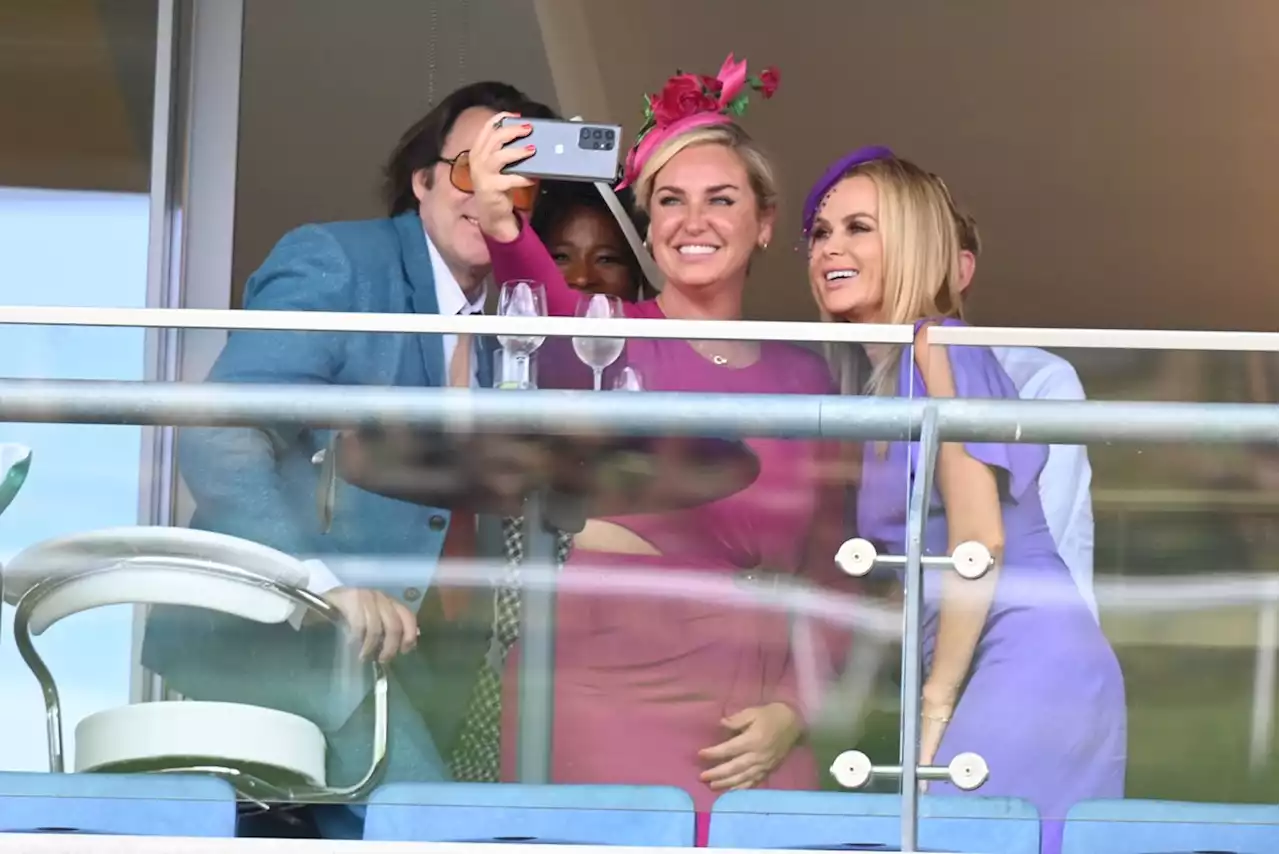 Josie Gibson beams as she poses for a selfie with Amanda Holden at Ascot