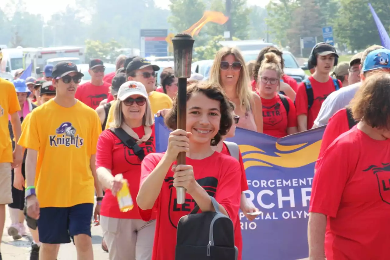 Photos: Police boost Special Olympics with torch run