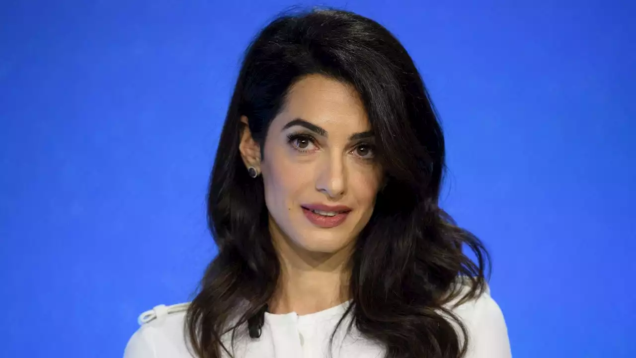 Amal Clooney’s Vacation Hair Is All About Bombshell Curls