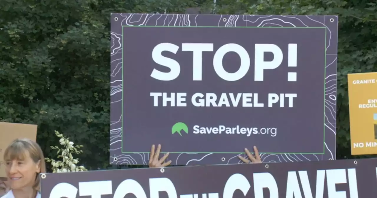 Dozens rally outside DAQ in opposition of Parleys Canyon mine