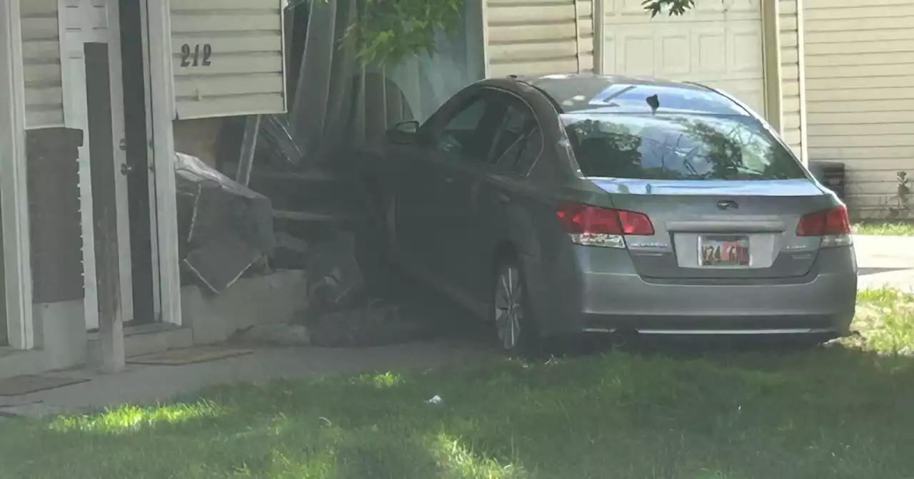 Driver crashes into Sandy living room with family inside, no one injured