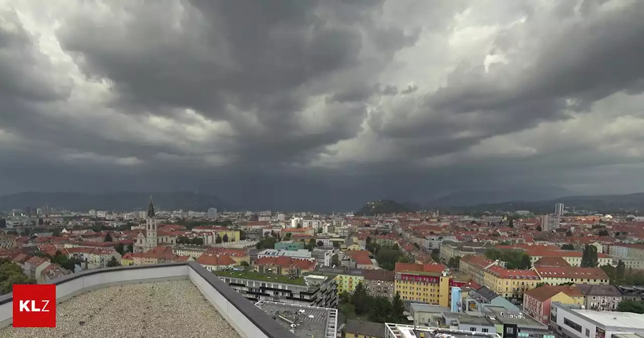 Dunkle Wolken über Graz: Wasserrohrbruch bremst Autos, das drohende Unwetter die Schloßbergbahn