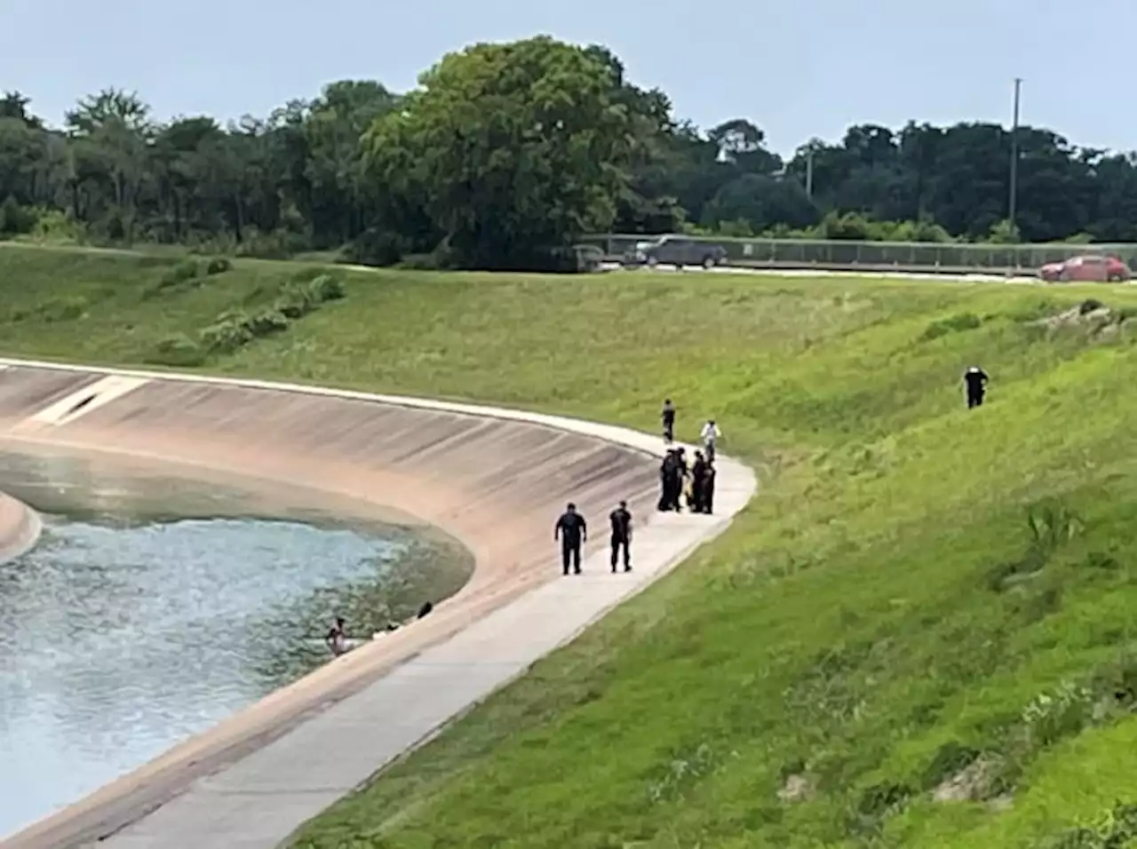 Body reported in Brays Bayou actually man swimming to cool off